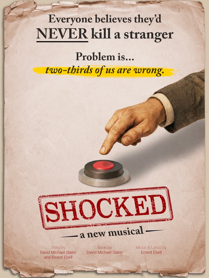 Shocked, a new musical. A hand hovers over a red shock button.